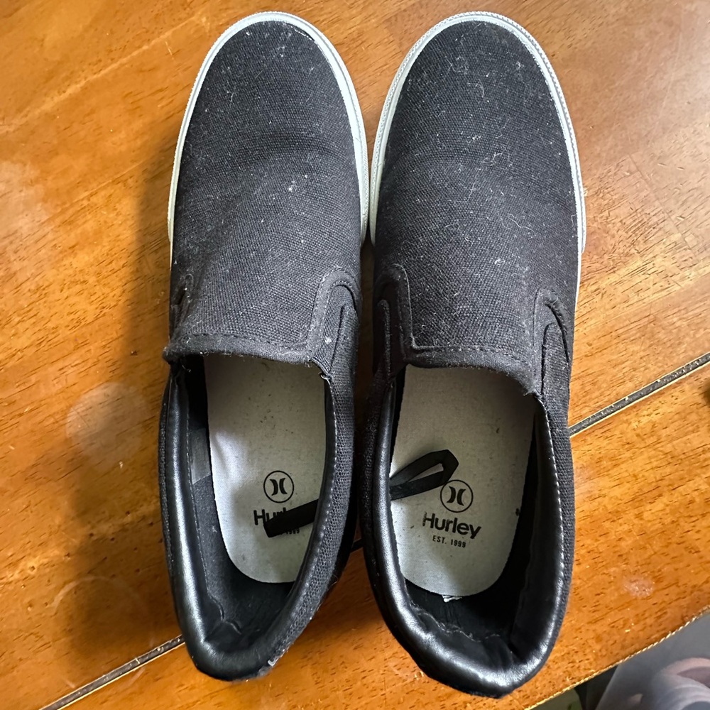 Hurley black slip on’s (Size 10)